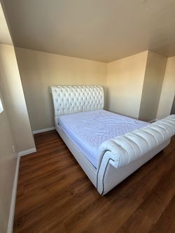 Cal king bed with mattress and boxspring