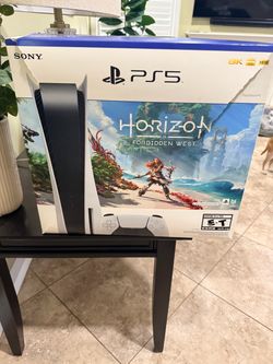 PS5 console with headset and games