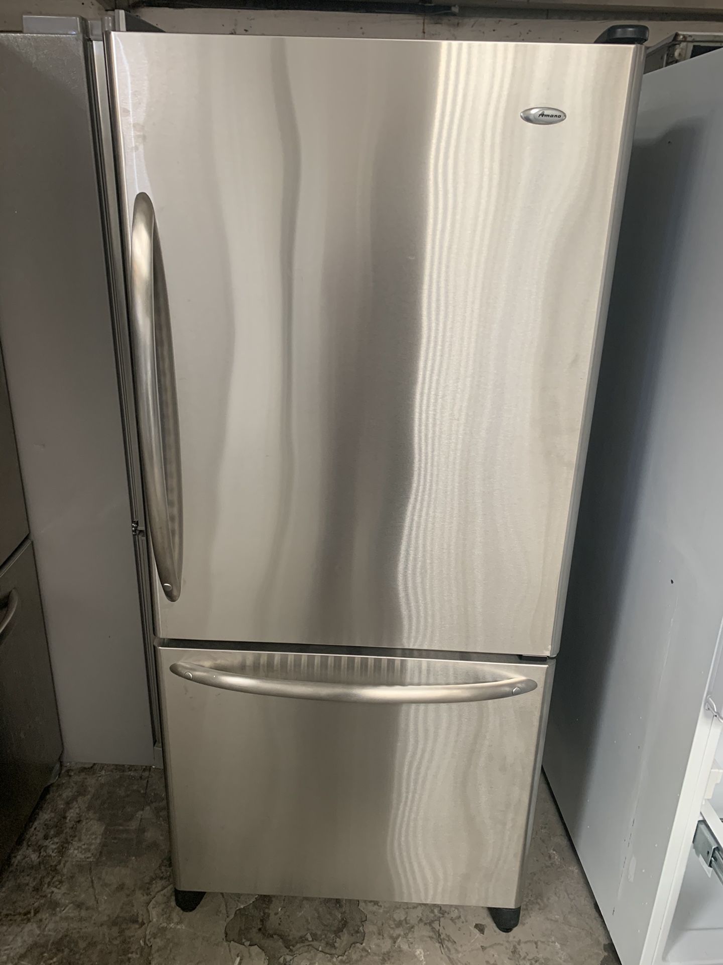 Refrigerator brand Amana everything is good working condition 90 days warranty delivery and installation
