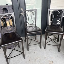 3 counter height chairs
