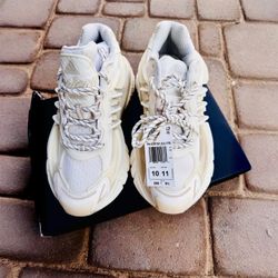 0B0! BRAND NEW / NEVER WORN  Pharrell Williams x VIRGINIA x adidas Originals Adistar Jellyfish “Triple White” sneakers.  Size: US Men’s 10 / US Women’