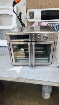 Chefman 10-in-1 Stainless Steel French Door Toaster Oven Air Fryer.(se hable español)