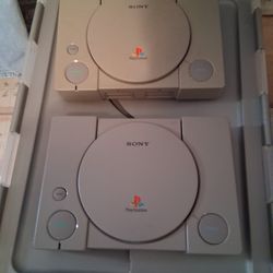 2 Playstation Consoles 