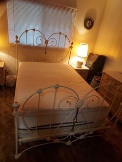 Iron Heart ornate twin bed frame and mattress