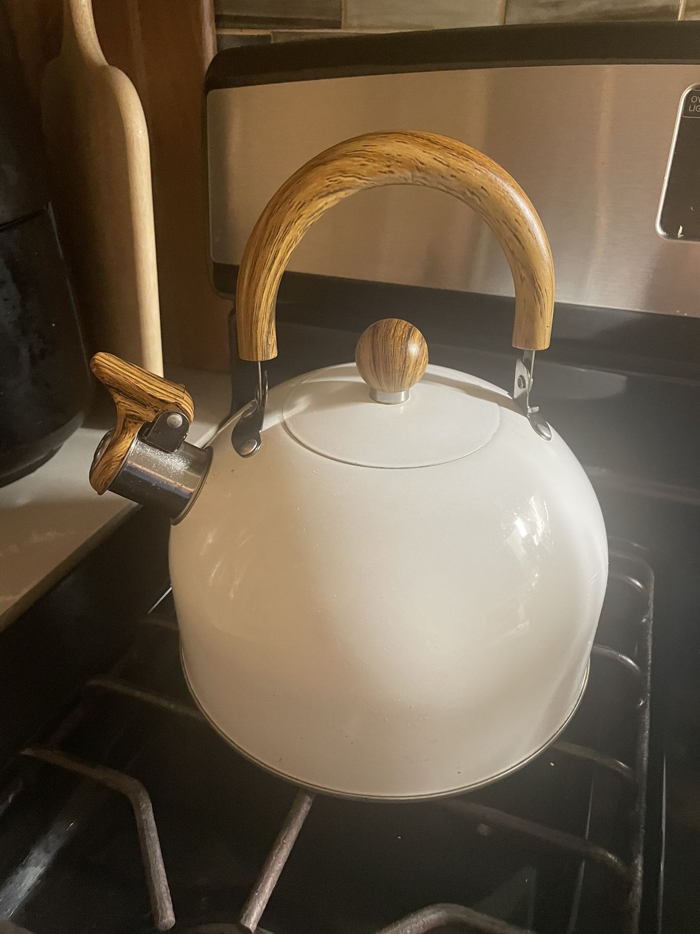 White Whistling Tea Kettle With Wood Style Handle