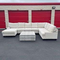 Living Spaces Sectional Couch with Striped Ottoman