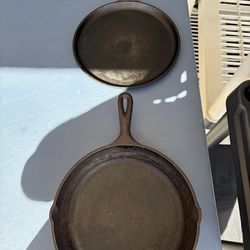 Lodge 12 in. Cast Iron Skillet Black with Double Pour Spout,10SK  This vintage Lodge cast iron griddle