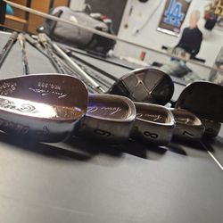 Golf Clubs.Cleveland  Irons 6-9 PW and + Calloway 5 Hybrid. Still Putter Included