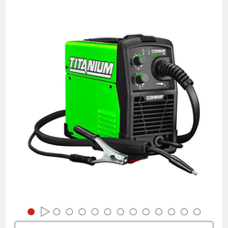 Welder and welding helmet. brand new!!!