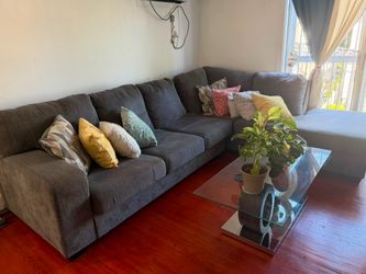Grey L-Shaped Sectional Sofa + Glass Coffee Table