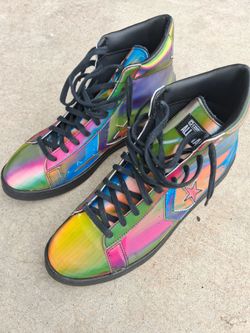Two Separate Pairs of Converse Shoes