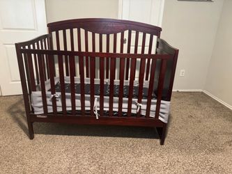Crib with a gently used mattress
