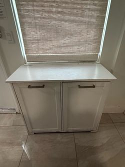 White wood trash bag bin