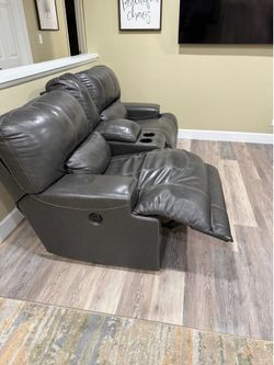 Ashley furniture grey leather couch
