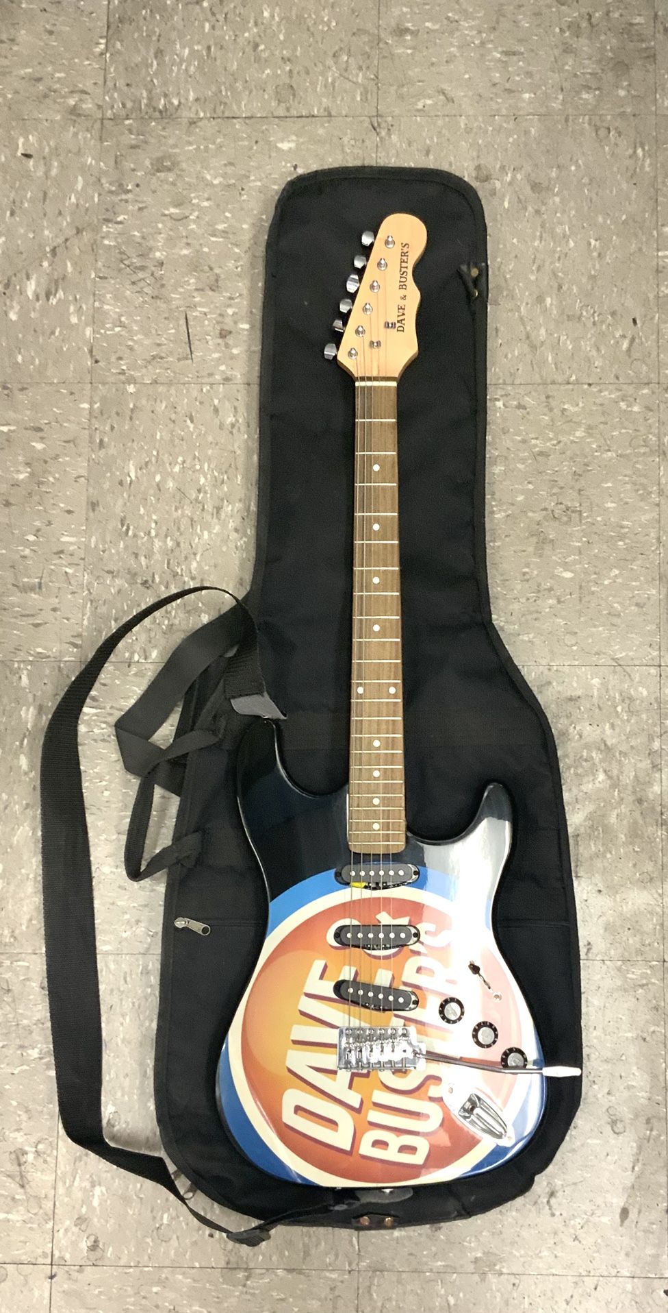 Dave & Busters Electric Guitar 5 String Logo Design Brand Pickups Bridge Fretboard Body Neck Tone Music Audio Record Concert Performance Collectable