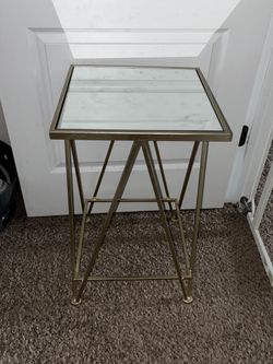 Table gold metal mirror top tag still on it