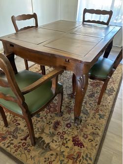 Antique Dining Table and 4 chairs (2 with arm rests)