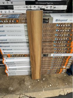 Lifeproof Camel Lake Ash 22 MIL X 7.1 in. W x 48 in. L Click Lock Waterproof Luxury Vinly Plank Flooring (18.7 sqft/case)