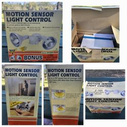 NEW- ZENITH Motion Sensor Light Control. Come's With 2- 150W Bulbs Included