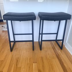 Antisha 24" Counter Stool with Faux Leather Seat & Built-In Footrests (Set of 2)