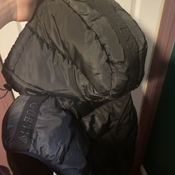Guess Brand all black Hooded puffer vest.