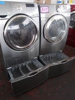 Samsung front load washer and dryer set with pedestals in excellent conditions