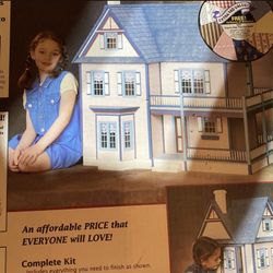 Brand new - Unopened doll  house you build it out of wood