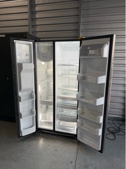 GE CAFE Refrigerator stainless with Ice maker. See pics for measurements. Works great. READ DESCRIPTION  72” tall. 28” deep. 36” wide.   My brother is