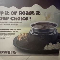 Chocolate Fondue Set – NEW in Box (Never Used) 🍫✨  Turn any night into a fun dessert experience with this electric chocolate fondue set — perfect for