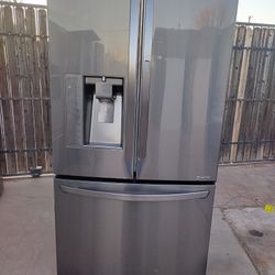 LG. black stainless steel fridge