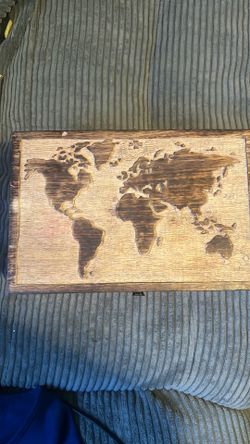 Little wooden box with map on top
