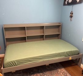 Used twin bed with book shelf and drawers