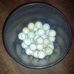 30 Titleist Golf Balls Including 7 Pro v 1's 