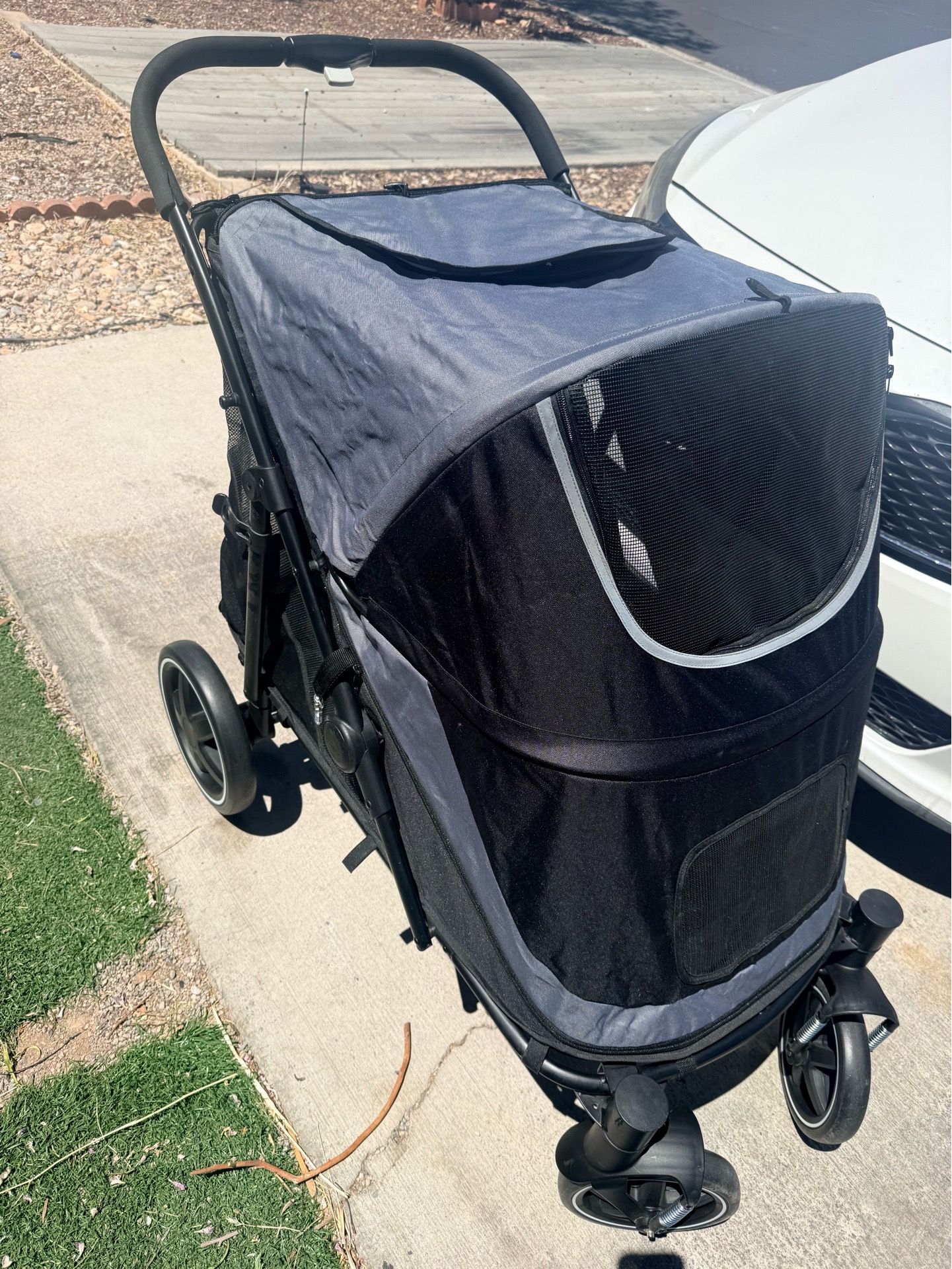 One click folding dog stroller