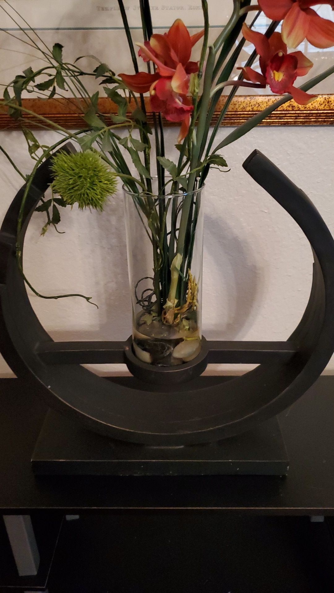 Wooden vase holder with flowers and vase