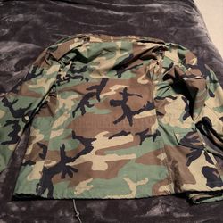 Military-style camouflage jacket with hood.