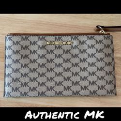 Authentic MK Wristlet Never Used