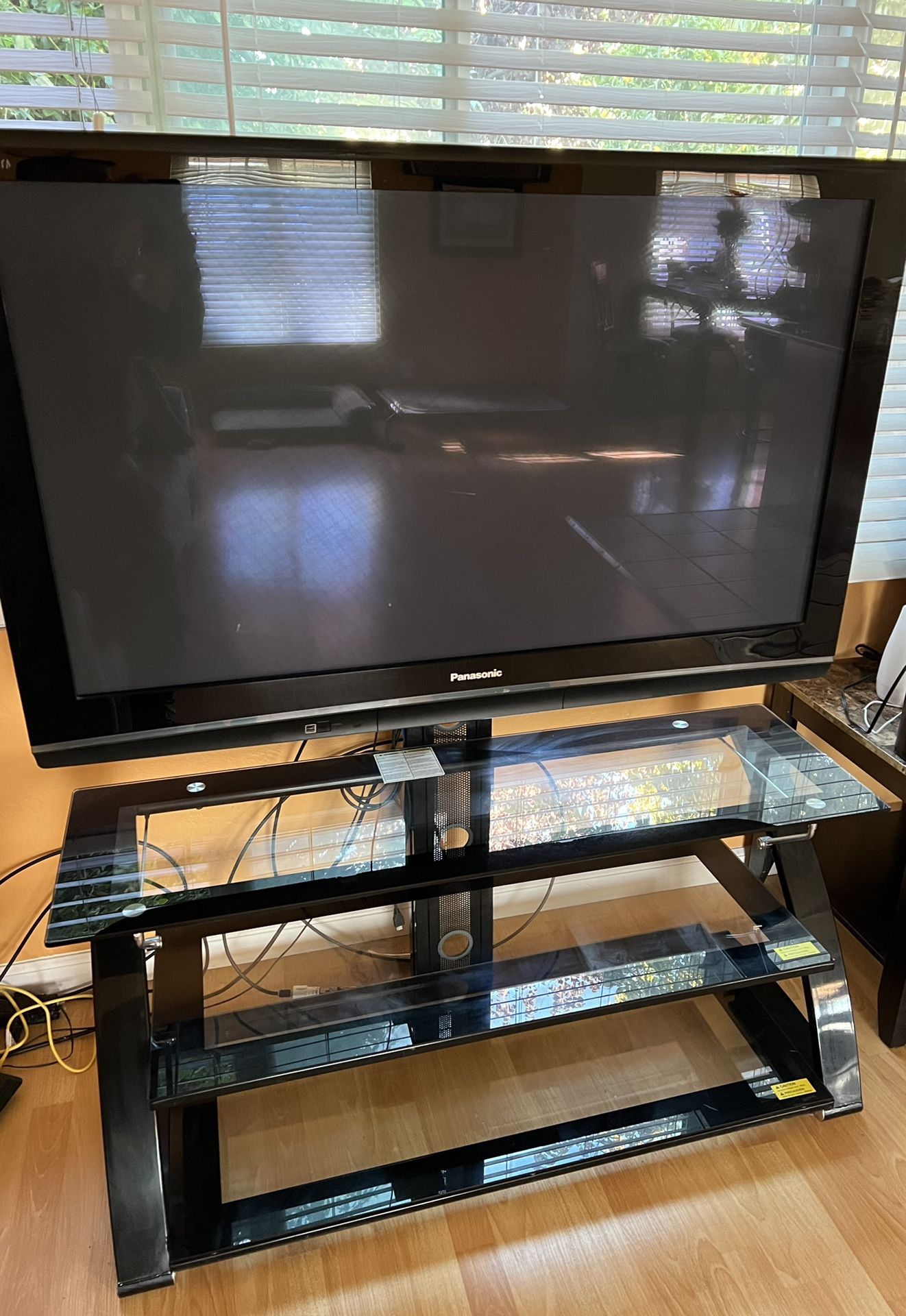 50 “ Television With Stand And Glass Shelves