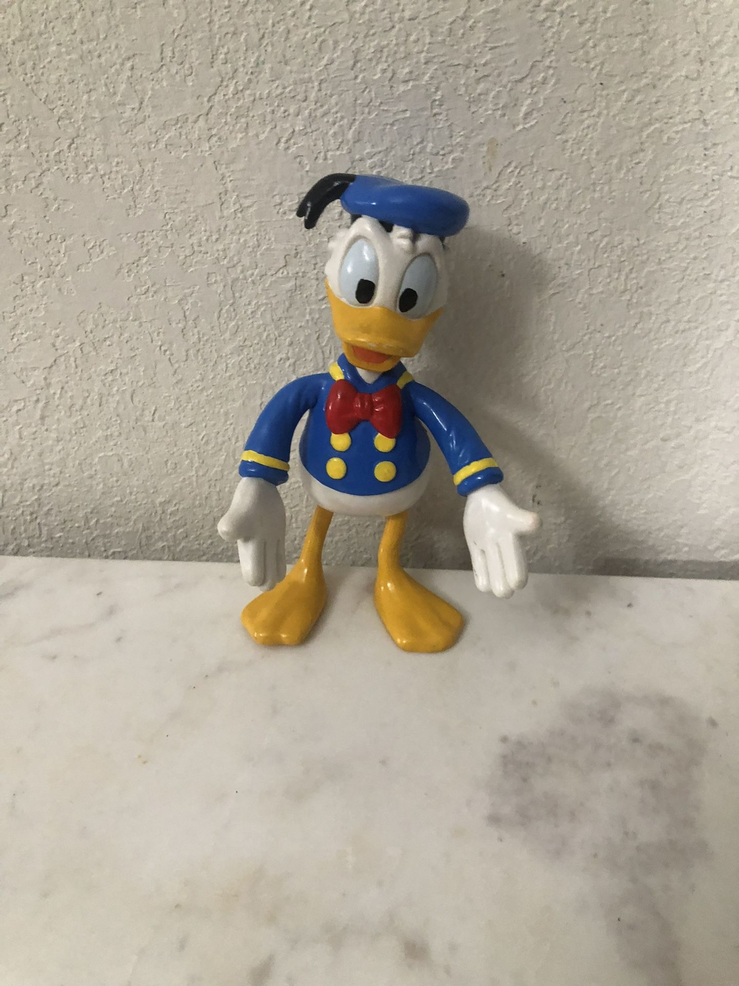 Vintage Disney Donald Duck Rubber Figure Bendable Arms And Legs. Size 5 inches Tall . Preowned some very minor pair wear due to age. See pictures.