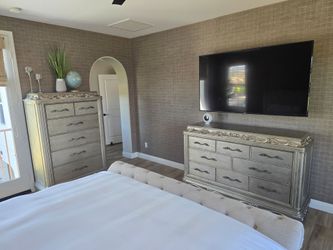 Full bedroom set includes headboard footboard king size mattress that is adjustable with heat and massage two end tables dresser and chest beautiful c