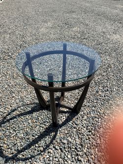 Two glass end tables w matching glass coffee table