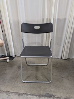 Black Metal Folding Chair with Integrated Handles