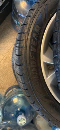 BRAND NEW FORD TAURUS RIMS AND TIRES. 5x114.3