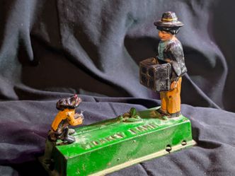 Vintage cast iron jumping monkey bank