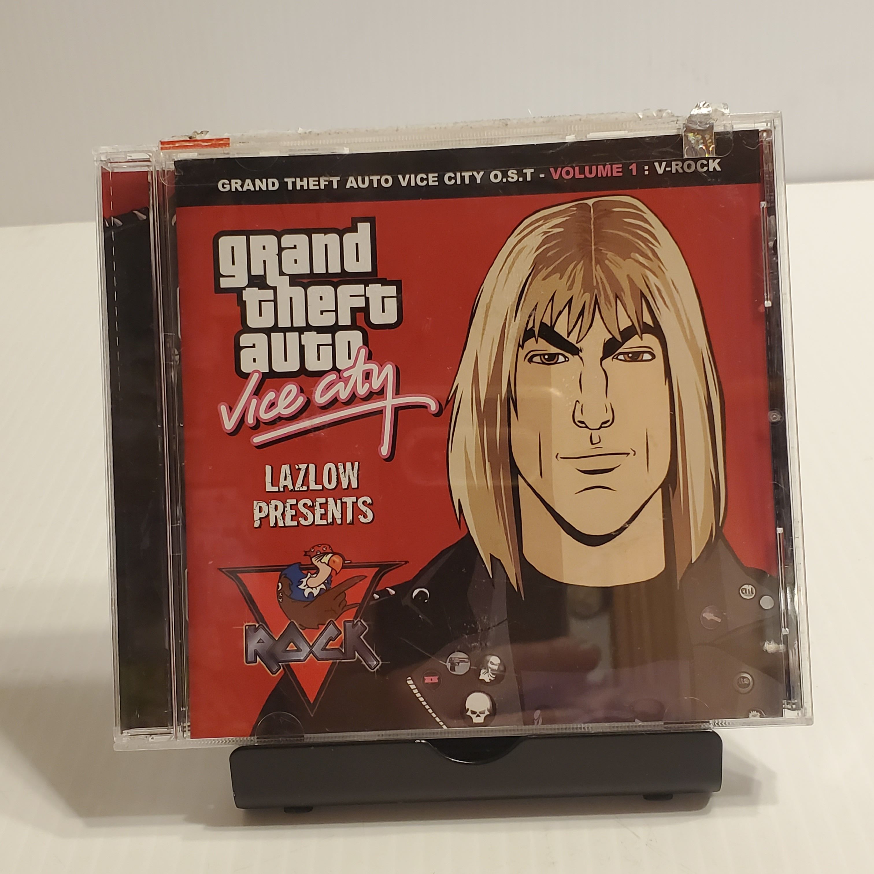 Grand Theft Auto Vice City CD Vol. 1 V-Rock by Various Artists. UPC 696998700222. Pre-owned, very good shape.