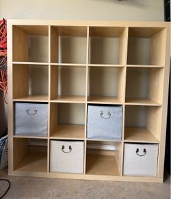 12-cube wooden storage organizer with 4!fabric storage bins included