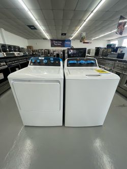 GE 4.5 cu. ft. Top Load Washer in White with Dual Action Agitator, Spanish Language Control Panel and Sanitize with Oxi and Dryer Gas