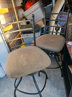 2/ 24 inch tall swivel stools,good cond
