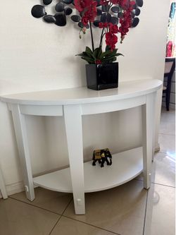 Entry table 49-1/2” long 18” wide and 30” high  in good condition