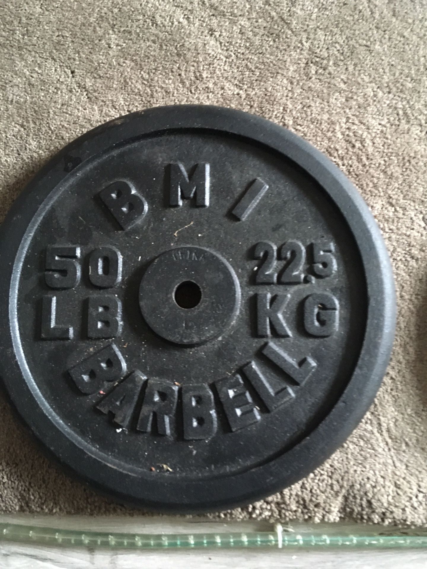 100 lbs of standard barbell plates